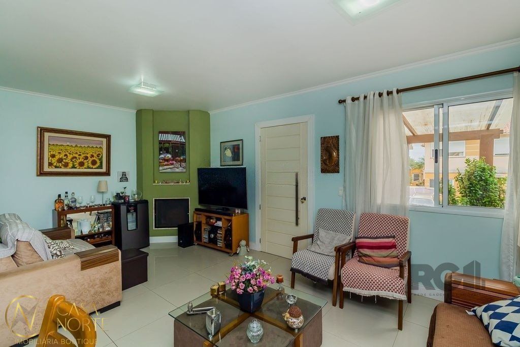 Casa de Condomínio à venda com 3 quartos, 197m², 2 suítes, 2 vagas, Rua Adao Gregory no bairro Mário Quintana em Porto Alegre