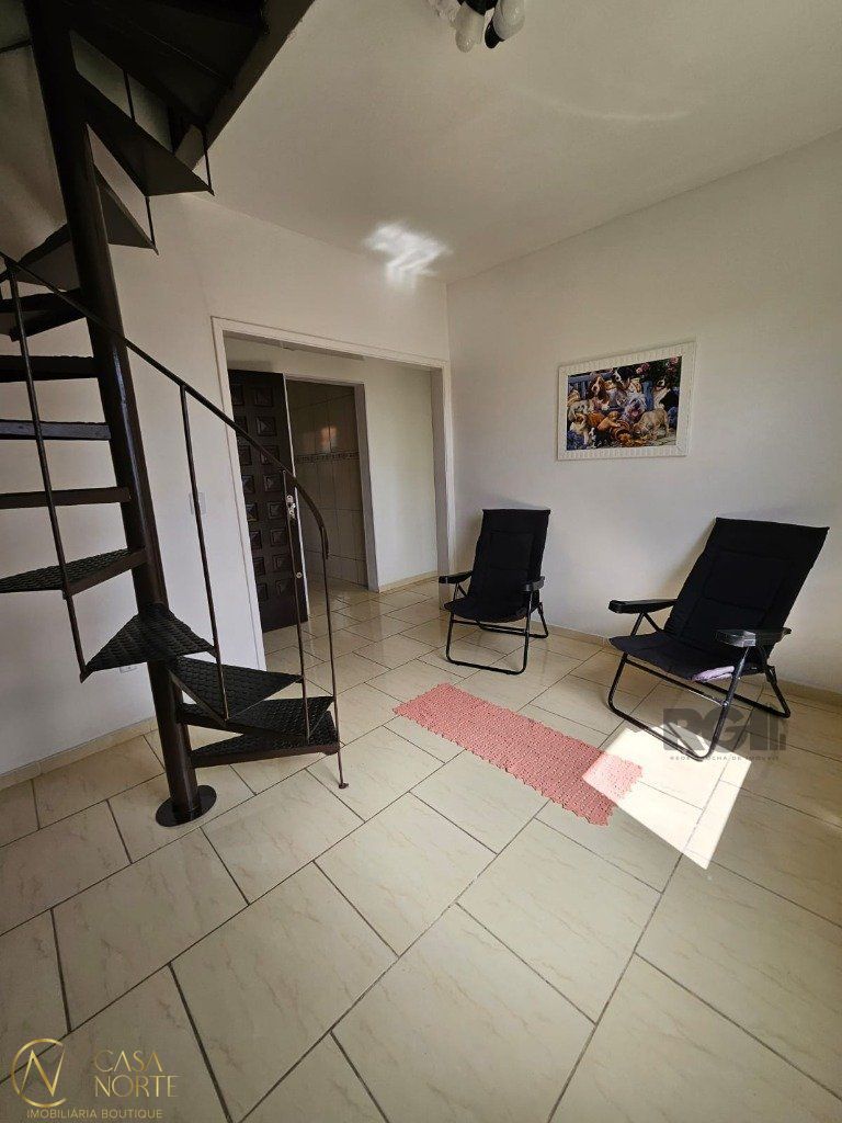 Casa à venda com 11 quartos, 338m², 3 suítes, 4 vagas, Rua Oscar Tollens no bairro Santa Tereza em Porto Alegre