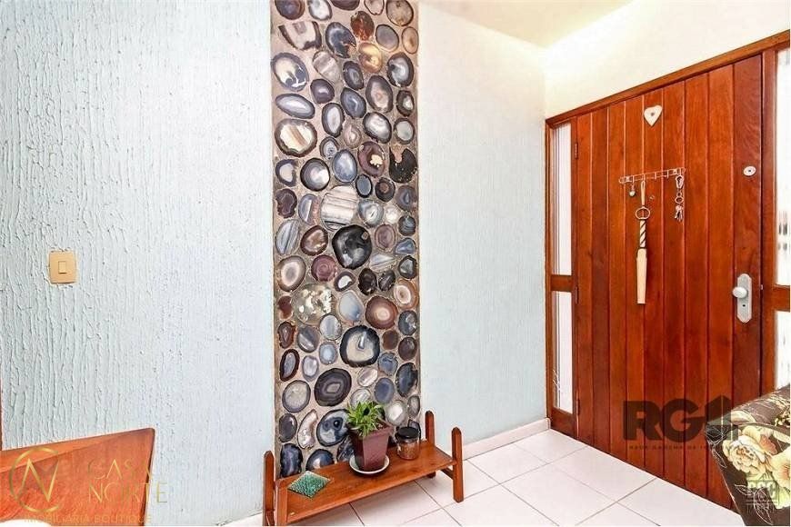 Casa à venda com 4 quartos, 285m², 1 suíte, 4 vagas, Rua Doutor Murtinho no bairro Bom Jesus em Porto Alegre