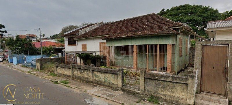 Casa à venda com 2 quartos, 120m², 2 vagas, Rua Bibiano de Almeida no bairro Glória em Porto Alegre