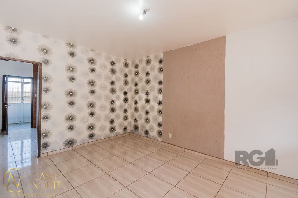 Casa à venda com 2 quartos, 159m², 3 vagas, Rua Cacilda Yaconis Becker no bairro Rubem Berta em Porto Alegre