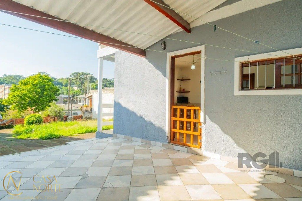 Casa à venda com 3 quartos, 118m², 1 suíte, 2 vagas, Rua Mathilde Zatar no bairro Nonoai em Porto Alegre