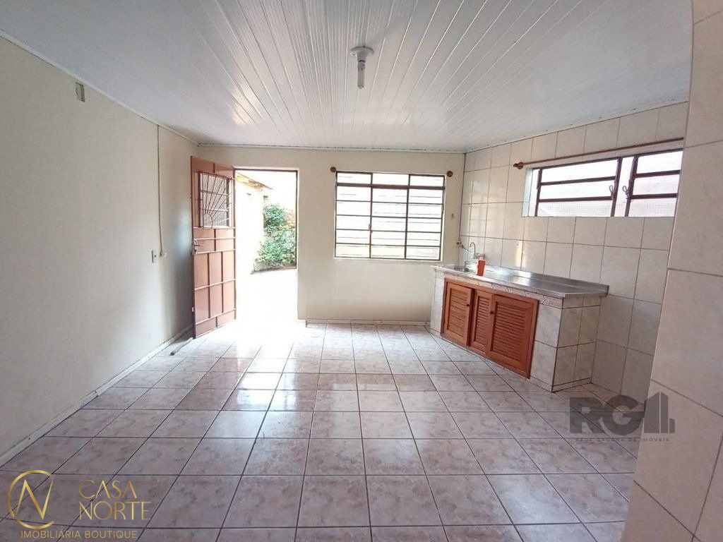 Casa à venda com 2 quartos, 121m², 3 vagas, Avenida Vereador Roberto Landell de Moura no bairro Campo Novo em Porto Alegre