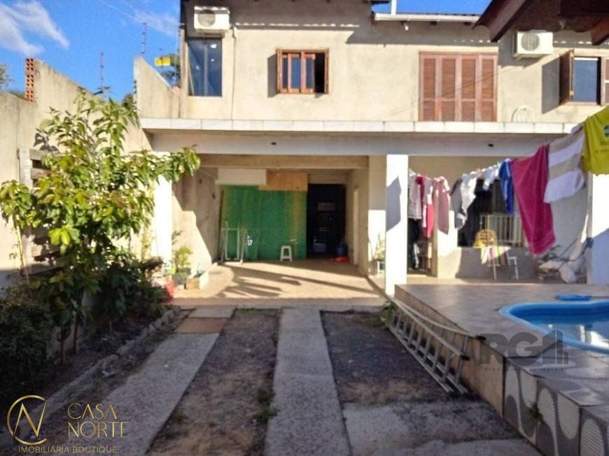 Casa à venda com 4 quartos, 191m², 1 suíte, 4 vagas, Rua Amadeu Amaral no bairro Vila São José em Porto Alegre