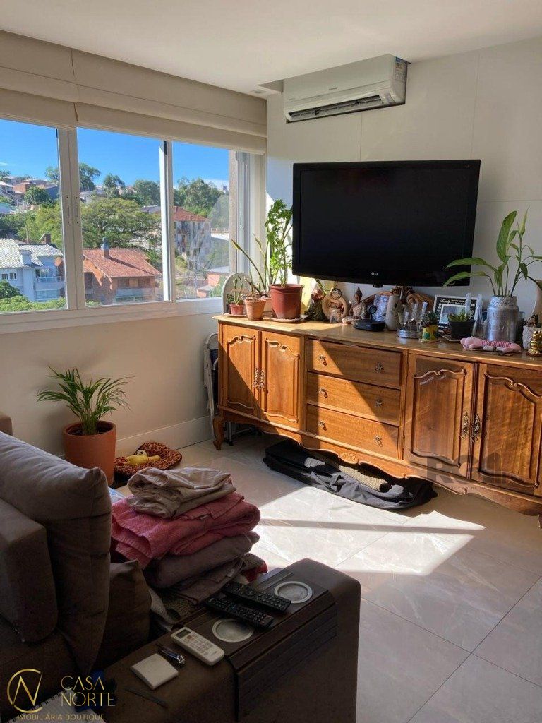 Apartamento à venda com 2 quartos, 59m², 1 suíte, 1 vaga, Rua Dário Totta no bairro Teresópolis em Porto Alegre