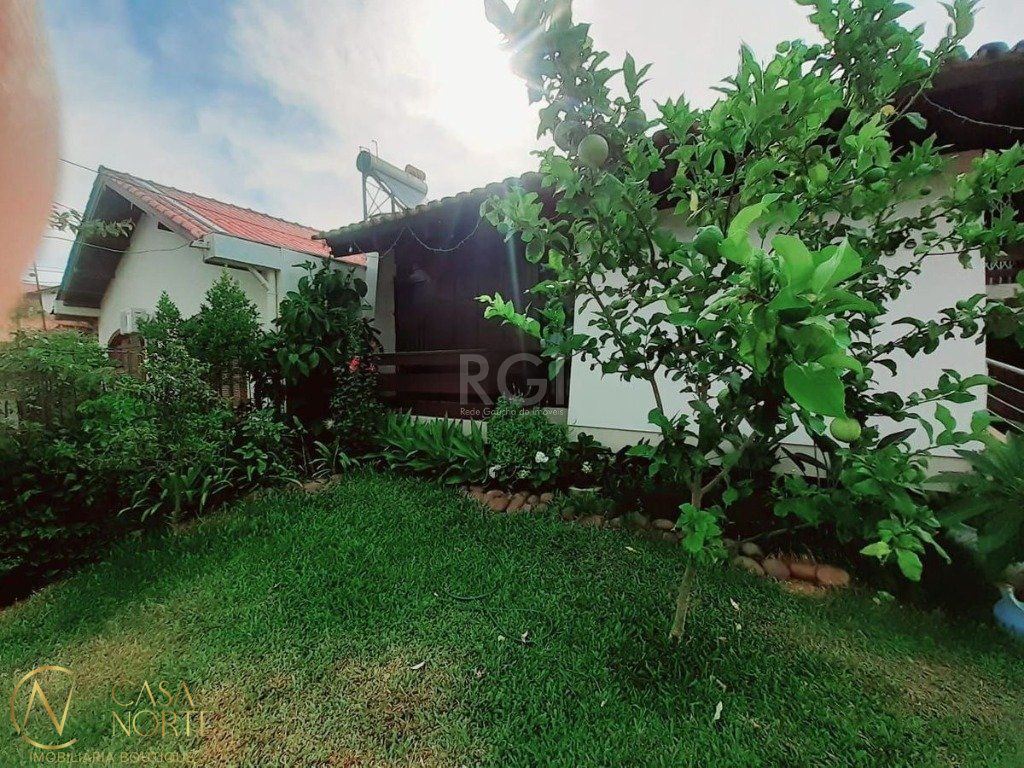 Casa à venda com 4 quartos, 260m², 1 suíte, 4 vagas, Rua Xavier da Cunha no bairro Nonoai em Porto Alegre