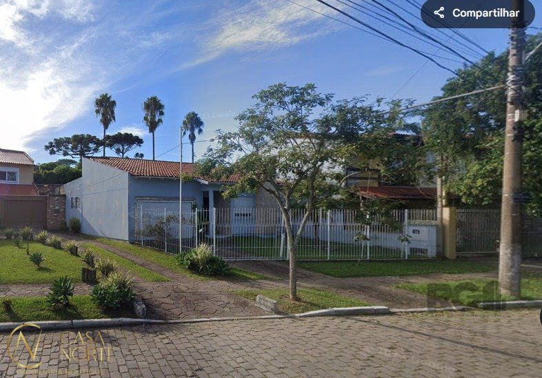 Casa à venda com 3 quartos, 261m², 1 suíte, 2 vagas, Rua Adao Pinheiro da Silva no bairro Ipanema em Porto Alegre
