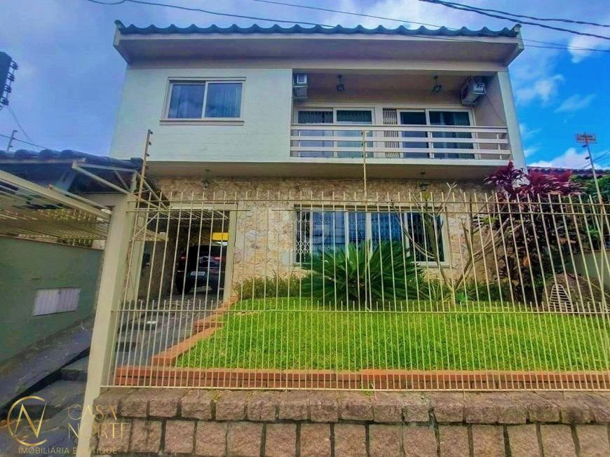 Casa à venda com 3 quartos, 250m², 2 suítes, 3 vagas, Rua Ibiruba no bairro Cavalhada em Porto Alegre