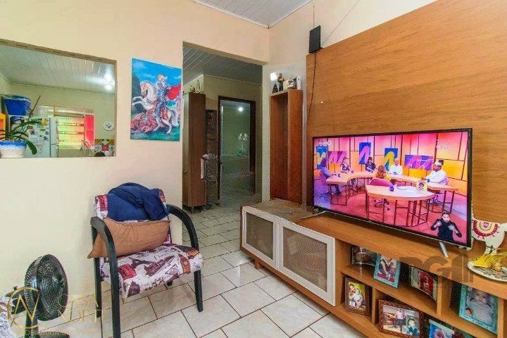 Casa à venda com 2 quartos, 70m², 3 vagas, Rua Banco Inglês no bairro Santa Tereza em Porto Alegre