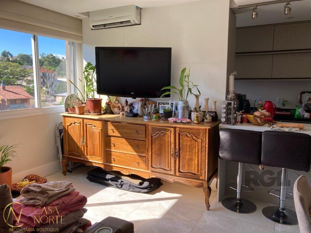 Apartamento à venda com 2 quartos, 59m², 1 suíte, 1 vaga, Rua Dário Totta no bairro Teresópolis em Porto Alegre