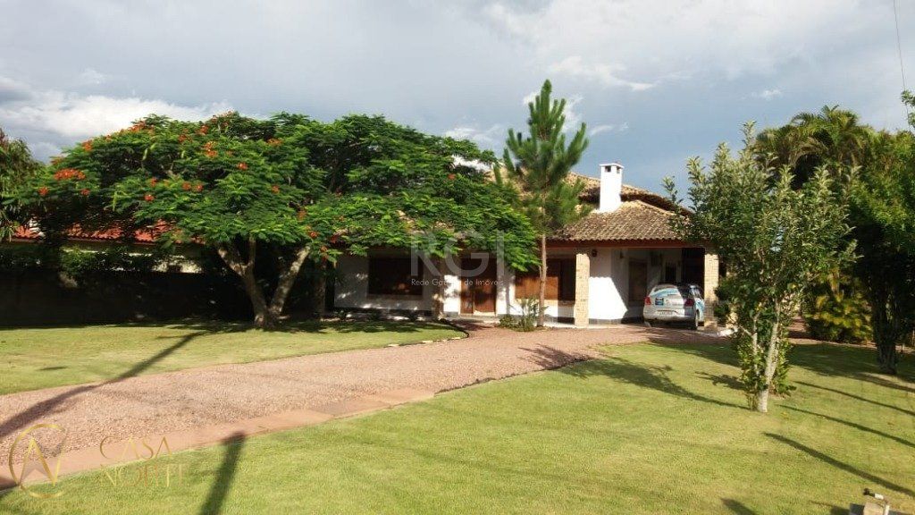Casa à venda com 2 quartos, 220m², 1 suíte, 4 vagas, Beco Arthur no bairro Boa Vista do Sul em Porto Alegre