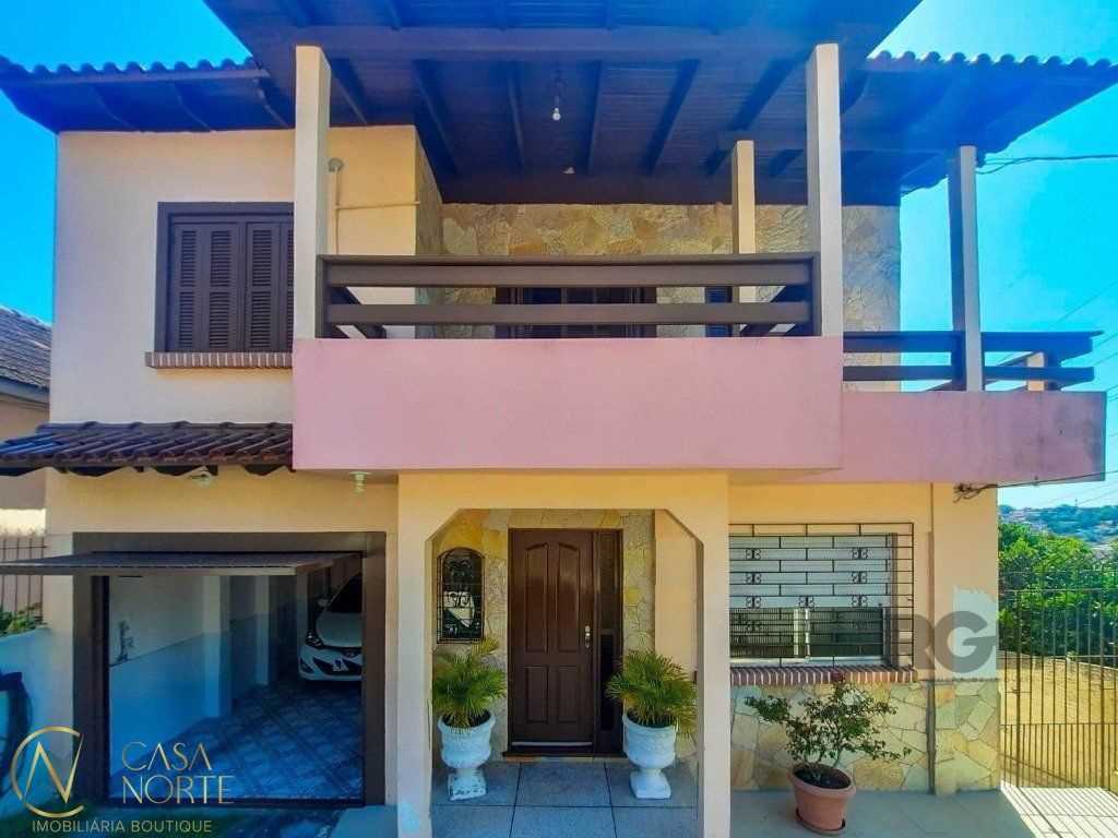 Casa à venda com 4 quartos, 240m², 2 vagas, Rua Engenheiro Oscar da Cunha Correa no bairro Jardim Carvalho em Porto Alegre