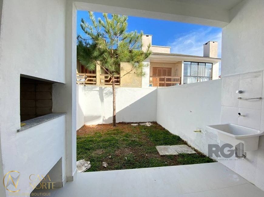 Casa à venda com 3 quartos, 126m², 2 suítes, 2 vagas, Rua Itacyr Rossi no bairro Guarujá em Porto Alegre