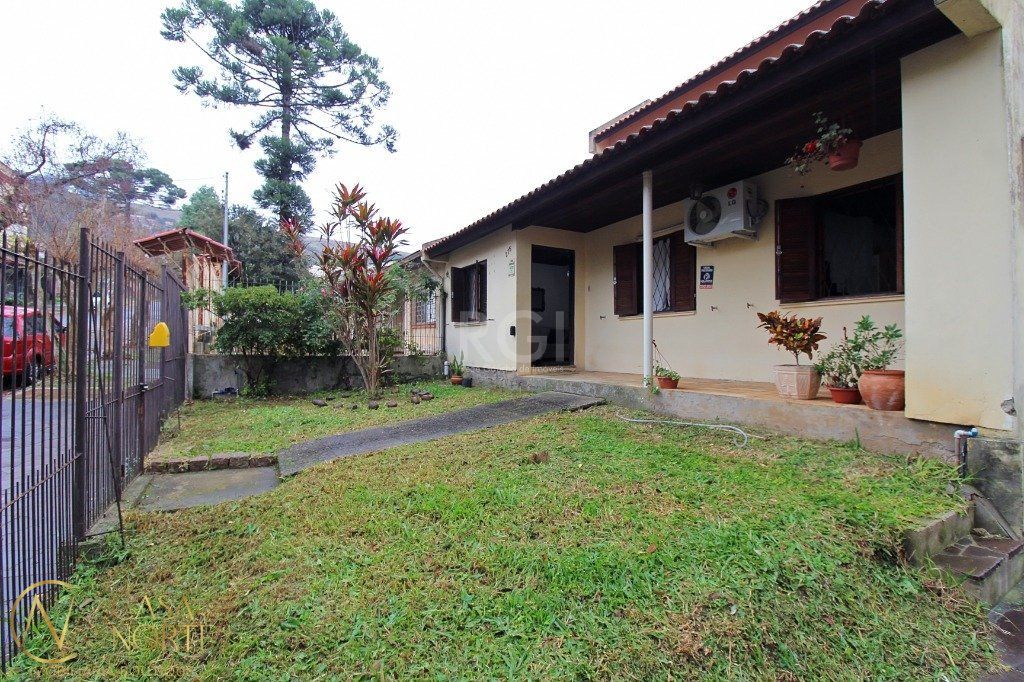 Casa à venda com 4 quartos, 150m², 1 suíte, 3 vagas, Rua Doutor Ney Cabral no bairro Nonoai em Porto Alegre