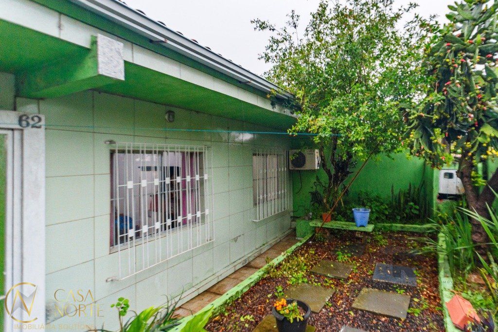 Casa à venda com 4 quartos, 131m², Avenida Cruz Alta no bairro Nonoai em Porto Alegre