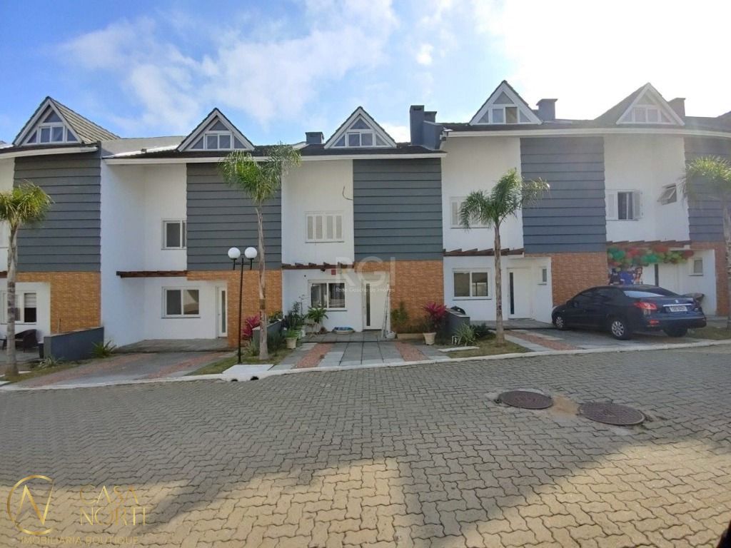 Casa de Condomínio à venda com 3 quartos, 134m², 1 suíte, 2 vagas, Rua Manuele Cristiane Gonçalves no bairro Vila Nova em Porto Alegre