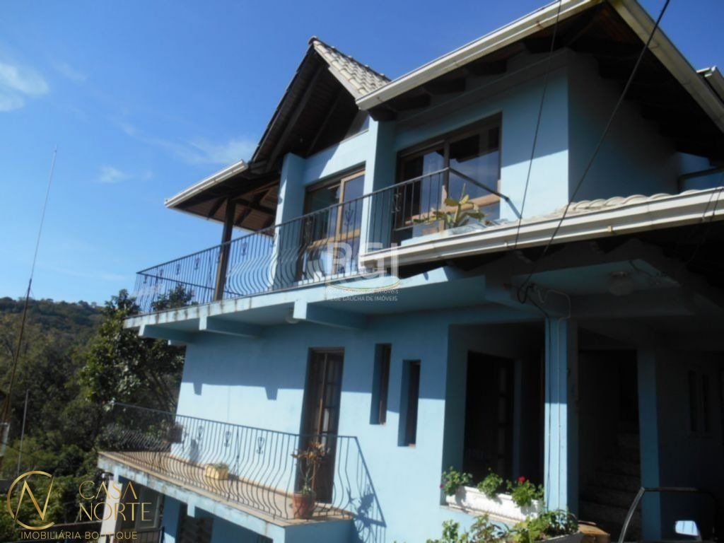Casa à venda com 4 quartos, 185m², 2 suítes, 4 vagas, Rua Taveira Junior no bairro Nonoai em Porto Alegre