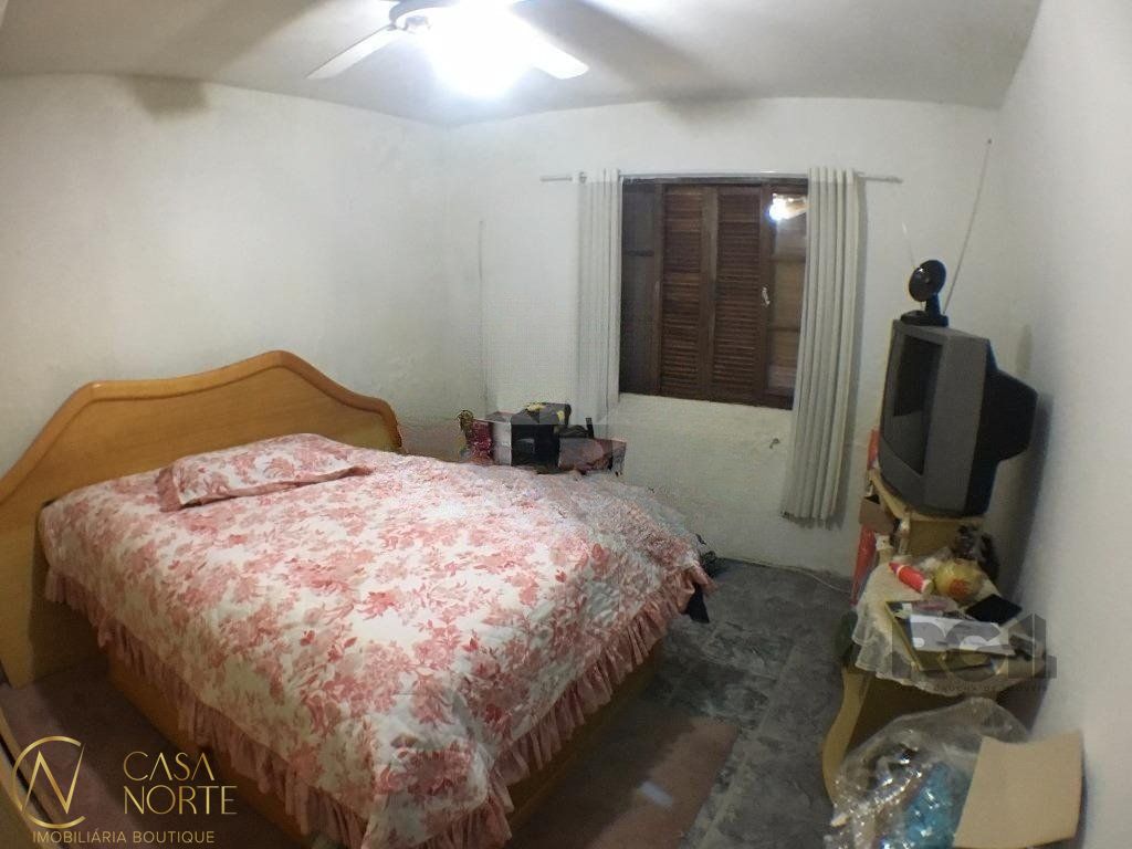 Casa à venda com 2 quartos, 150m², 1 vaga, Rua Professor Rubens Guelli no bairro Vila Nova em Porto Alegre