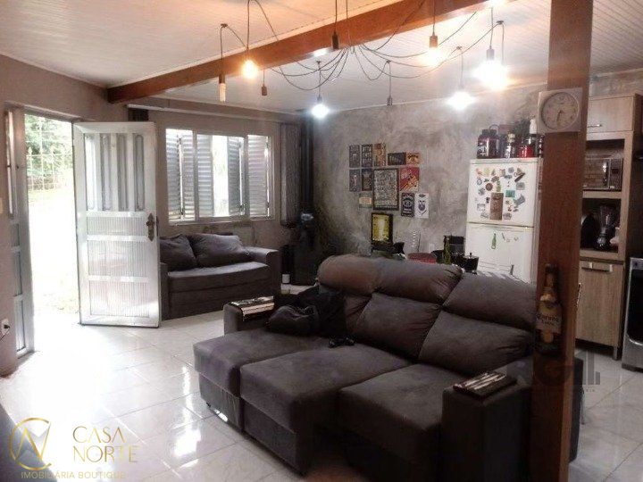 Casa à venda com 3 quartos, 100m², 1 suíte, 2 vagas, Rua Rudi Schaly no bairro Parque Santa Fé em Porto Alegre