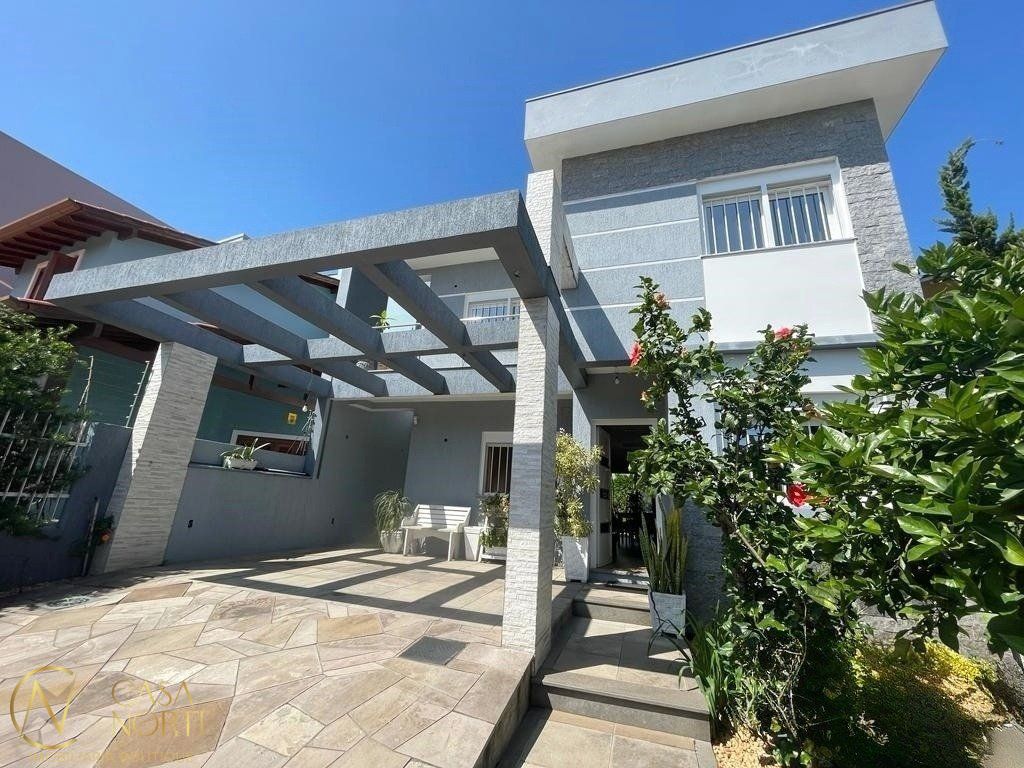 Casa à venda com 3 quartos, 151m², 1 suíte, 2 vagas, Rua Théo Benevenuto no bairro Sarandi em Porto Alegre