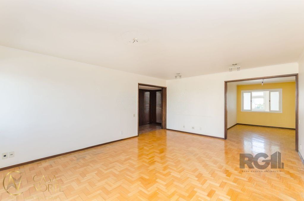 Apartamento à venda com 3 quartos, 152m², 2 suítes, 2 vagas, Avenida Carlos Gomes no bairro Auxiliadora em Porto Alegre