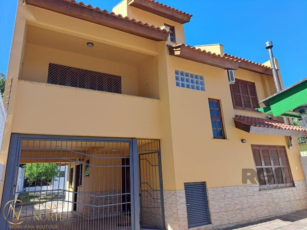 Casa à venda com 5 quartos, 265m², 1 suíte, 3 vagas, Rua Professor Antônio Peyrouton Louzada no bairro Jardim Carvalho em Porto Alegre