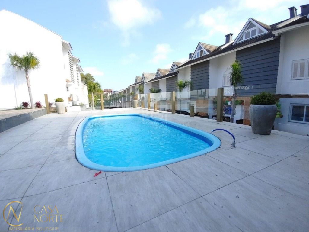 Casa de Condomínio à venda com 3 quartos, 134m², 1 suíte, 2 vagas, Rua Manuele Cristiane Gonçalves no bairro Vila Nova em Porto Alegre