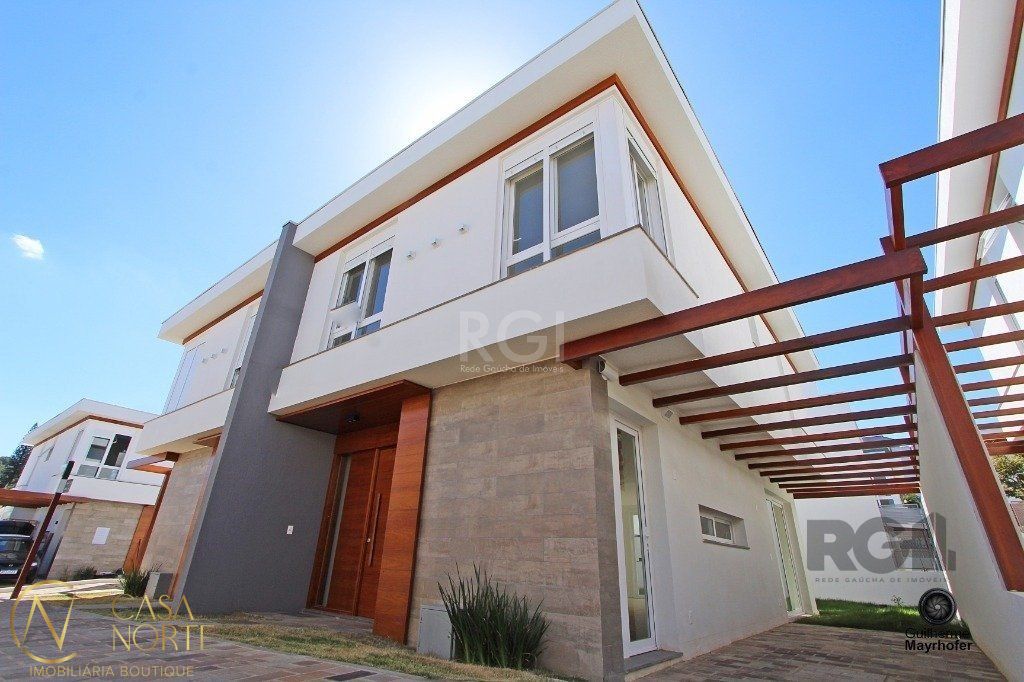 Casa de Condomínio à venda com 4 quartos, 218m², 3 suítes, 2 vagas, Avenida Clemenciano Barnasque no bairro Teresópolis em Porto Alegre