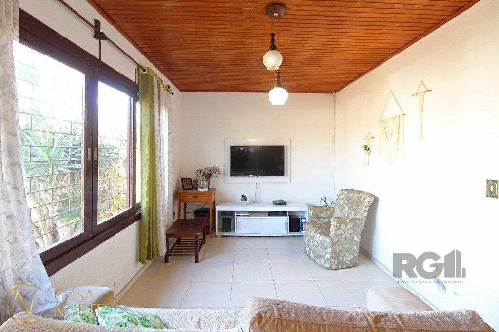 Casa à venda com 3 quartos, 168m², 2 vagas, Rua Engenheiro Jorge Porto no bairro Ipanema em Porto Alegre