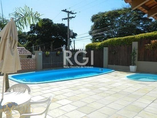 Casa de Condomínio à venda com 3 quartos, 95m², 1 vaga, Rua Humberto de Campos no bairro Partenon em Porto Alegre