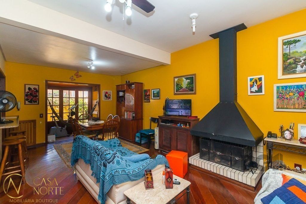 Casa à venda com 5 quartos, 164m², 2 vagas, Rua Doutor Pio Ângelo no bairro Ipanema em Porto Alegre