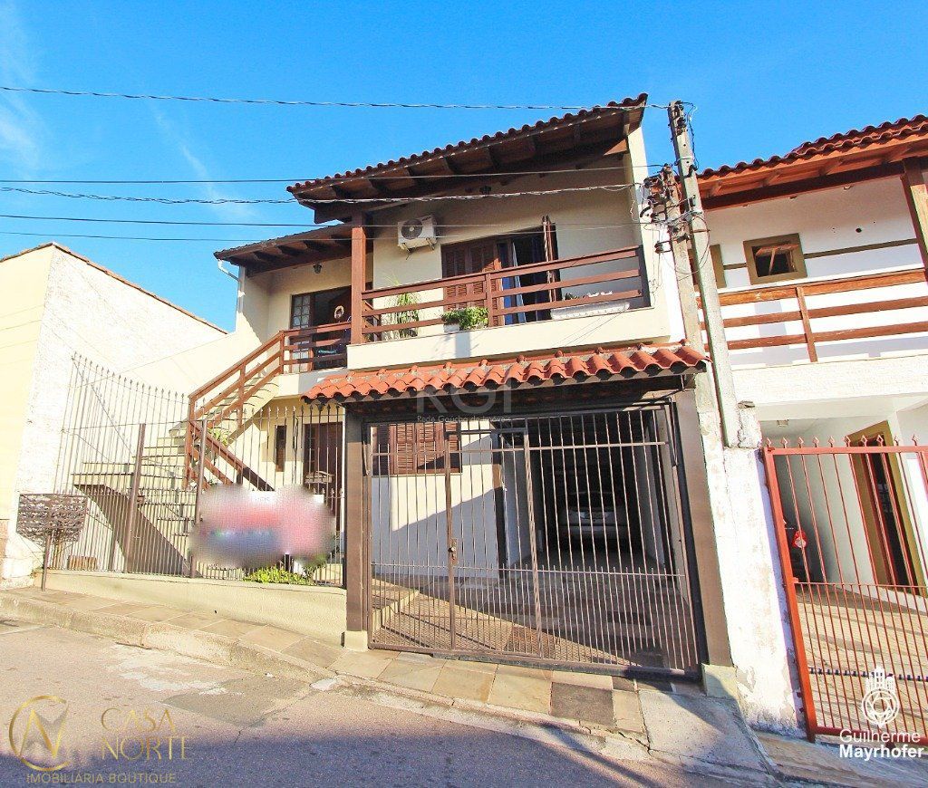 Casa à venda com 5 quartos, 245m², 3 vagas, Rua Waldomiro Silveira Dias no bairro Jardim Itu em Porto Alegre