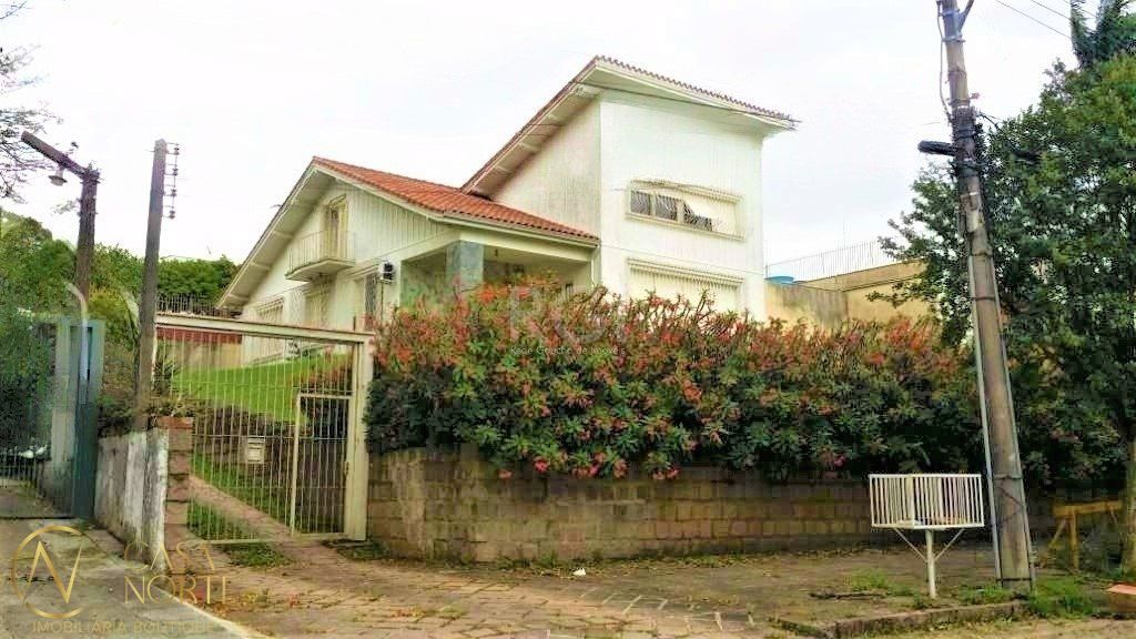 Casa à venda com 3 quartos, 583m², 4 vagas, Rua Felipe Becker no bairro Três Figueiras em Porto Alegre