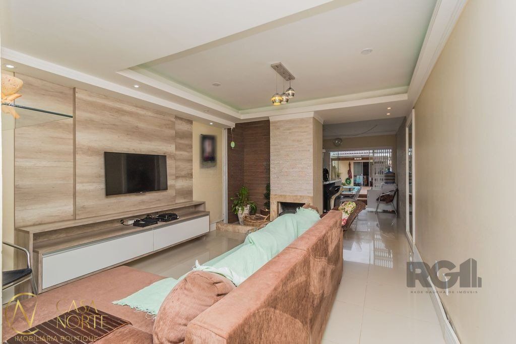 Casa à venda com 3 quartos, 165m², 1 suíte, 2 vagas, Rua Danton Krás Borges no bairro Guarujá em Porto Alegre