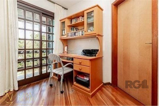 Casa à venda com 3 quartos, 260m², 1 suíte, 3 vagas, Rua Luiz Eurico Tejera Lisboa no bairro Costa e Silva em Porto Alegre