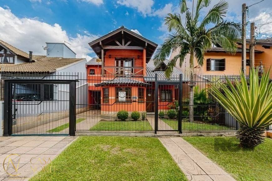 Casa à venda com 3 quartos, 209m², 1 suíte, 3 vagas, Rua Maria Elaine Wotter no bairro Parque Santa Fé em Porto Alegre