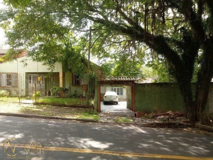 Casa à venda com 3 quartos, 100m², 1 suíte, 2 vagas, Rua Rudi Schaly no bairro Parque Santa Fé em Porto Alegre
