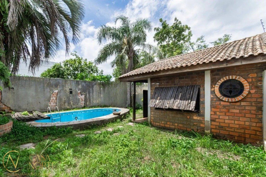 Casa à venda com 3 quartos, 286m², 2 vagas, Avenida Manoel Elias no bairro Jardim Leopoldina em Porto Alegre