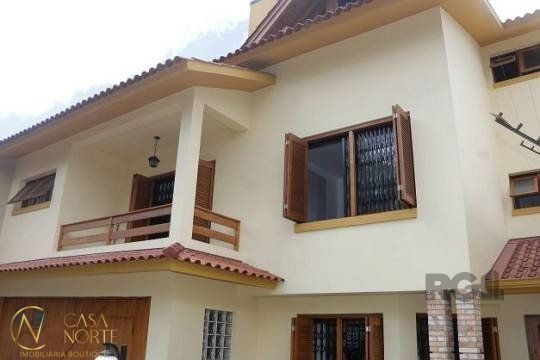 Casa à venda com 3 quartos, 287m², 1 suíte, 4 vagas, Rua Padre Todesco no bairro Partenon em Porto Alegre