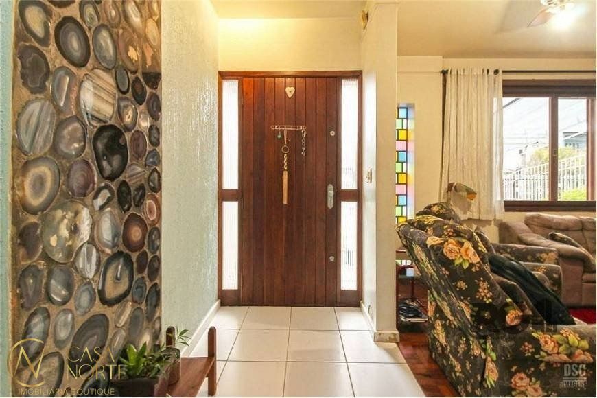 Casa à venda com 4 quartos, 285m², 1 suíte, 4 vagas, Rua Doutor Murtinho no bairro Bom Jesus em Porto Alegre