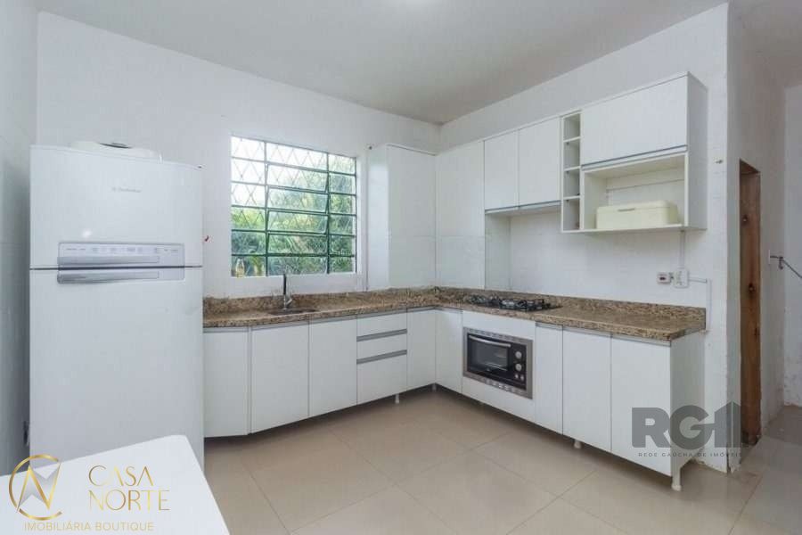 Casa à venda com 4 quartos, 160m², 2 suítes, 2 vagas, Rua Itagibá no bairro Santa Tereza em Porto Alegre