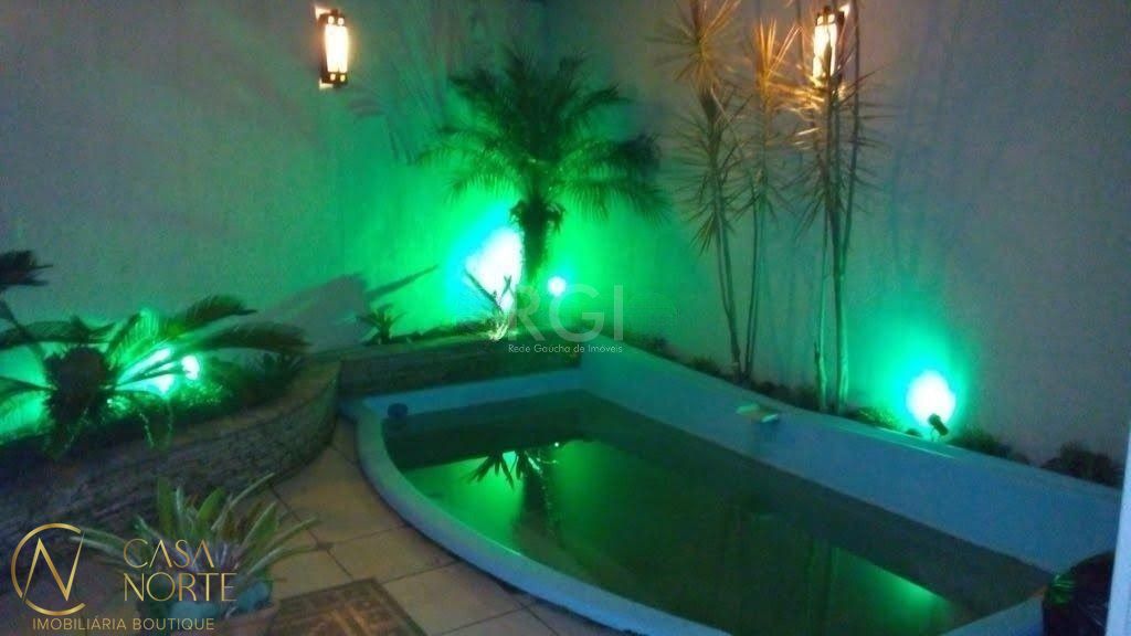 Casa de Condomínio à venda com 3 quartos, 350m², 2 suítes, 2 vagas, Rua Conrado Ferrari no bairro Jardim Isabel em Porto Alegre