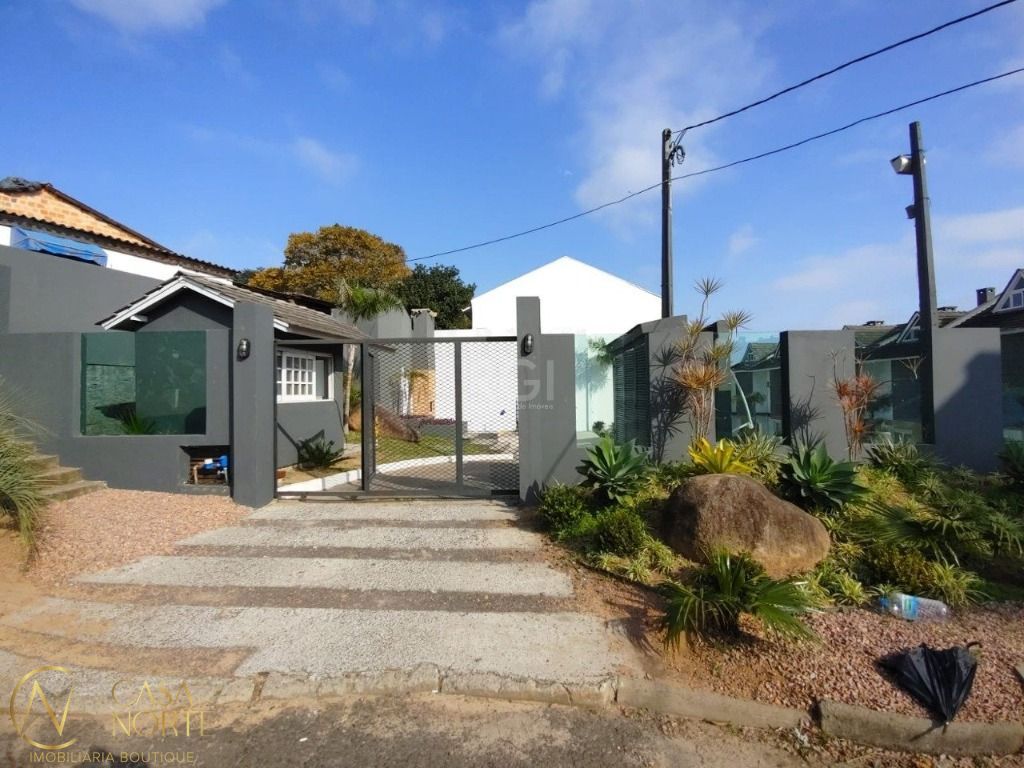 Casa de Condomínio à venda com 3 quartos, 134m², 1 suíte, 2 vagas, Rua Manuele Cristiane Gonçalves no bairro Vila Nova em Porto Alegre