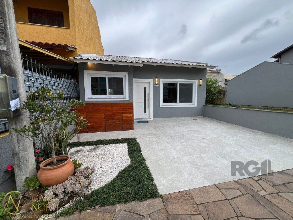 Casa à venda com 2 quartos, 95m², 1 suíte, 2 vagas, Rua Corticeira no bairro Hípica em Porto Alegre