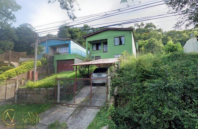 Casa à venda com 5 quartos, 280m², 2 vagas, Avenida Professor Oscar Pereira no bairro Cascata em Porto Alegre