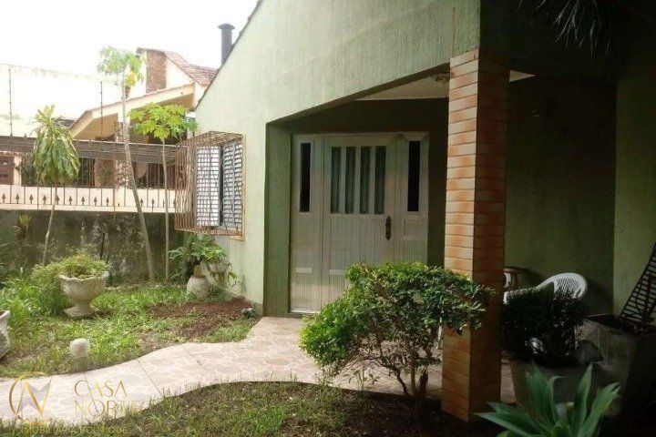 Casa à venda com 3 quartos, 100m², 1 suíte, 2 vagas, Rua Rudi Schaly no bairro Parque Santa Fé em Porto Alegre