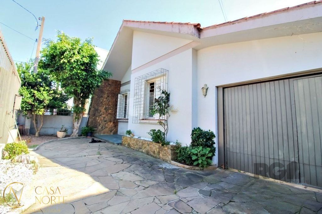 Casa à venda com 4 quartos, 160m², 1 suíte, 2 vagas, Rua General Cunha Louzada no bairro Glória em Porto Alegre