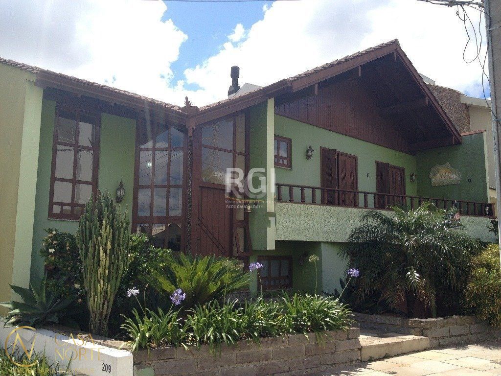 Casa de Condomínio à venda com 4 quartos, 350m², 1 suíte, 2 vagas, Rua Alcebiades Antônio dos Santos no bairro Nonoai em Porto Alegre