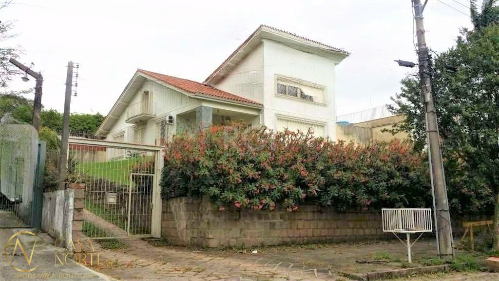 Casa à venda com 3 quartos, 583m², 4 vagas, Rua Felipe Becker no bairro Três Figueiras em Porto Alegre