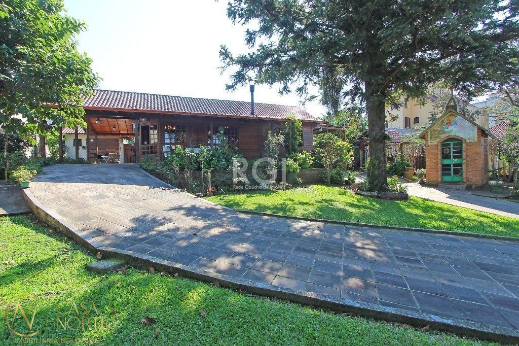 Casa à venda com 2 quartos, 205m², 1 suíte, 4 vagas, Rua Jaguari no bairro Cristal em Porto Alegre